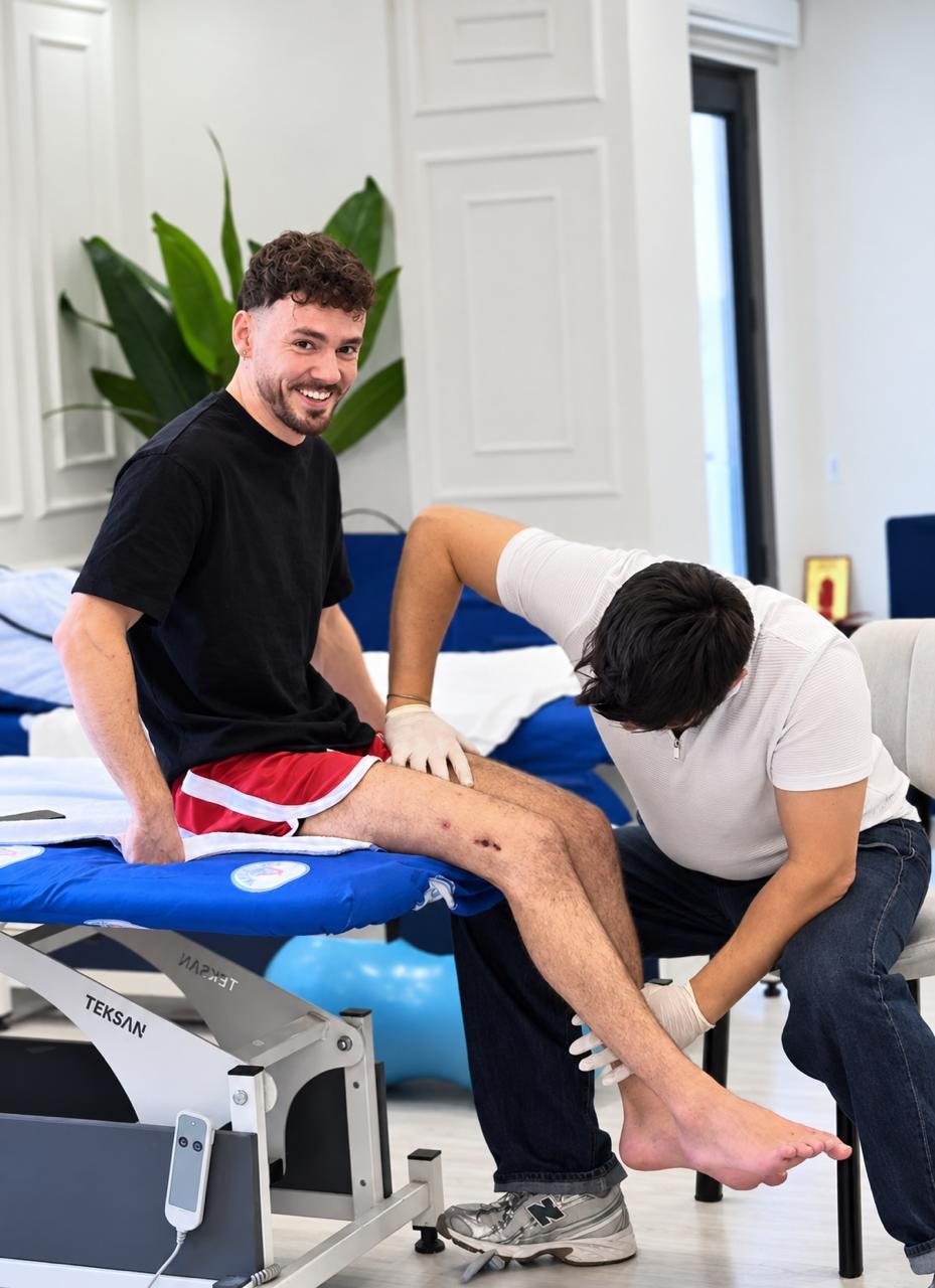 Patient smiling during a physiotherapy session