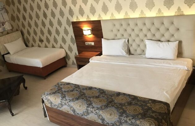 worldpoint-hotel-bedroom4-r3dbjp45t6hs9f03n0yg7h6qoir3rg9zefjwa40lv2